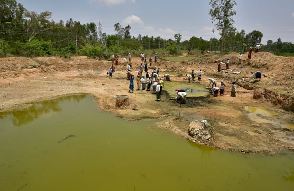 In pics: 3000 Mandya women labour in the sun to revive lakes, ponds