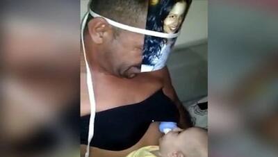 पिता ने करवाया बेटी को स्तनपान, इन तस्वीरों की कहानी जान रो पड़े लोग