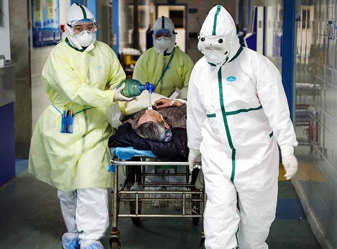कोरोना वायरस से चीन में 22 और लोगों की मौत, मामले घटने के बाद कई अस्थायी अस्पताल बंद