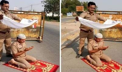 धर्म से ऊपर इंसानियत: ड्यूटी के दौरान कड़ी धूप में नमाज पढ़ रहा था, हिंदू पुलिसकर्मी ने गमछे से कर दी छांव