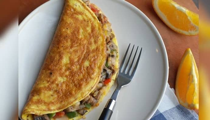 Mushroom cheese omelette Recipe: সকালের জলখাবারে রাখুন সুস্বাদু ও পুষ্টিকর মাশরুম চিজ অমলেট, জেনে নিন এর রেসিপ