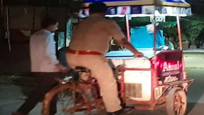 कानपुर में आइसक्रीम का ठेला ले जाते पुलिसकर्मी का वीडियो वायरल,पीछे दौड़ रहा था ठेले वाला; एसपी ने कही ये बात