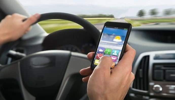 यूपी में नया ट्रैफिक रूल्स लागू, ड्राइविंग करते टाइम मोबाइल से बात करने पर देना होगा 10 हजार जुर्माना