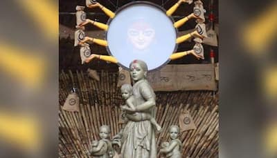 বরিশার ক্লাবের পুজো উদ্বোধনে মমতা,  আর্ট কলেজের প্রাক্তণীর সৃষ্টিতে প্লাবিত কলকাতা