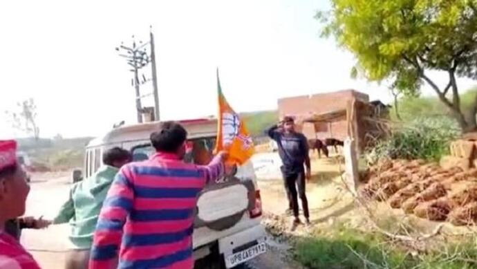 यूपी चुनाव के लिए वोट मांगने गए भाजपा नेताओं का हुआ विरोध, सपा समर्थकों ने नारेबाजी कर उतारा झंडा