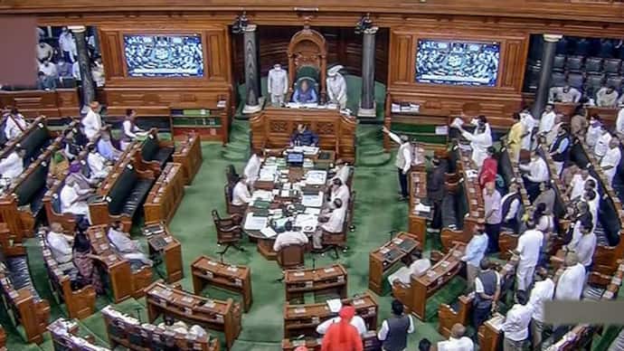Congress members protest in the Lok Sabha