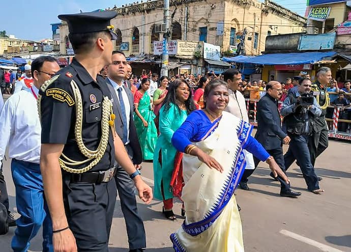 President Droupadi Murmu walks during her visit to Jagannath Temple in Puri