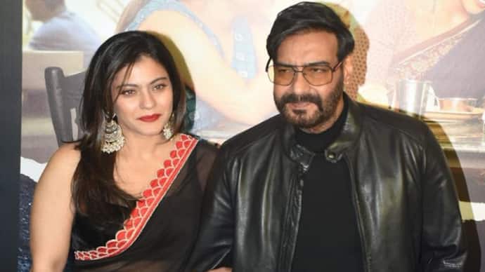 drishyam 2 kajol pose with ajay devgn shriya saran kisses husband at movie premiere KPJ