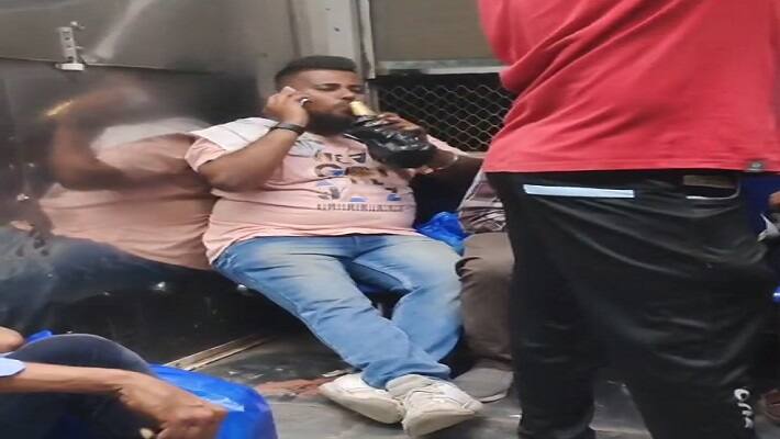 mumbai news,  appeal to action on passenger drinking alcohol inside local train, video goes viral
