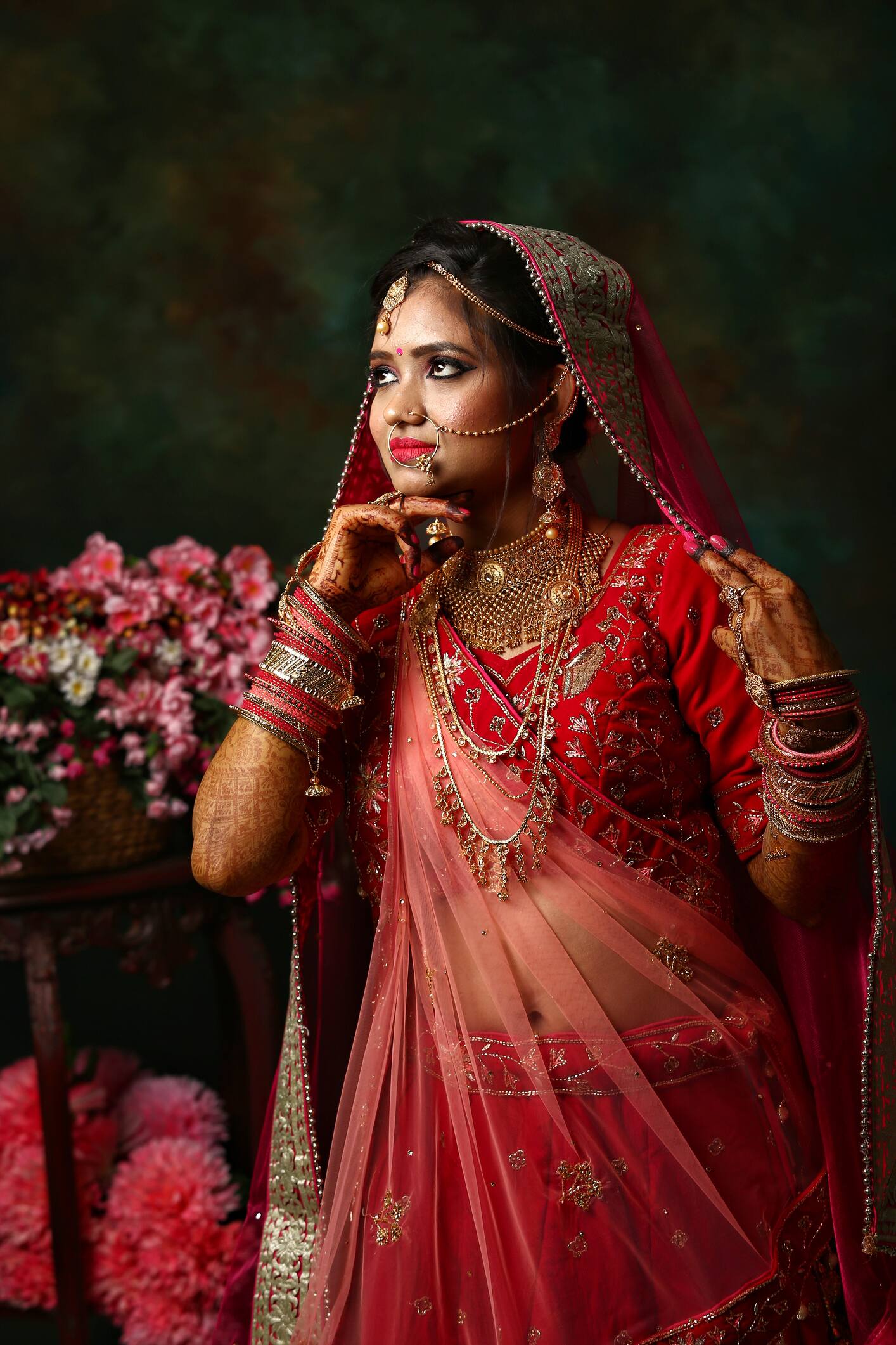The Wedding Script - That green jewelry against the red lehenga is making  this bride look strikingly beautiful, isn't it!? | Facebook