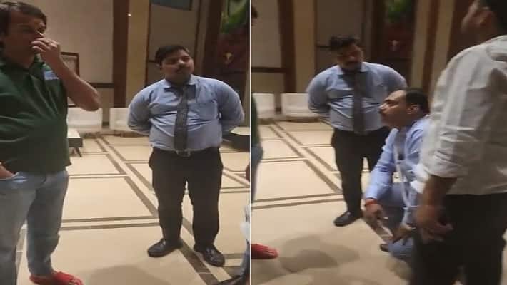 patna news Watch Viral Video Varanasi s Hotel Manager apologized on his knees in front of tej pratap yadav 