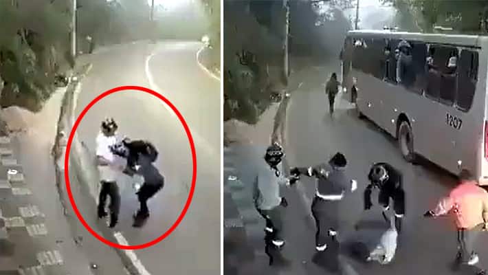 man harrassing woman on road gets good lesson