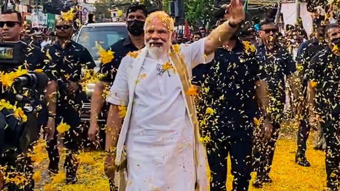 PM Modi receives rousing welcome in Kerala thousands line the road to see him