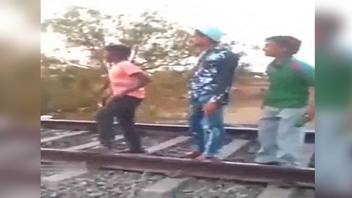 Boys on railway track