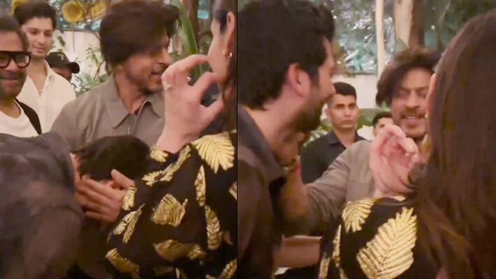 karan Deol touches Shah Rukh Khan Feet