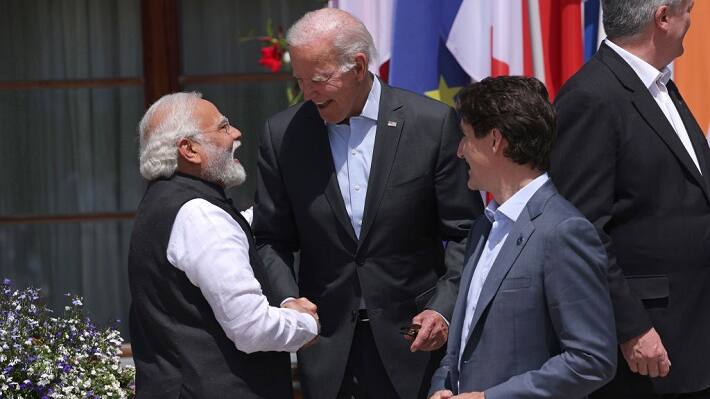 G7 Leaders Convene Joe Biden greets Narendra Modi