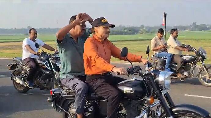 Video of Adhir Chowdhury bike riding in Baharampur goes viral  rode an Enfield bike without  helmet bsm