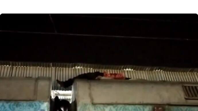 Man sleep in train roof video viral on social media