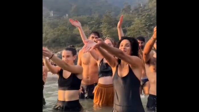 Rishikesh Viral Video  Netizens react to half-naked foreign nationals bathing in the Ganges bsm